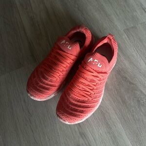 Pink APL running shoes